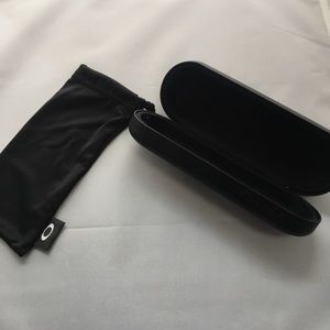 Brand new Oakley clam shell glasses hard case.